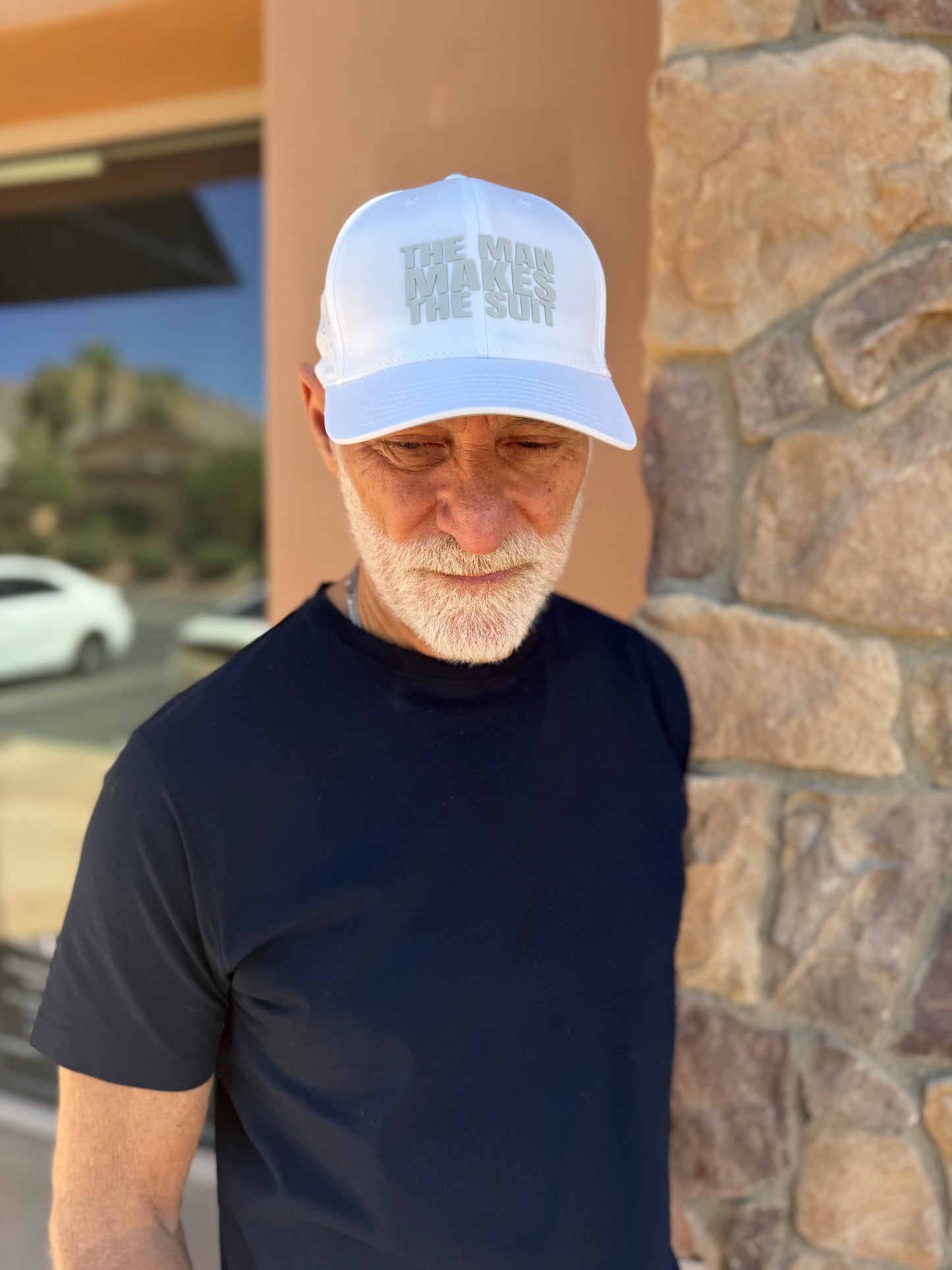 The Man Makes The Suit Hat